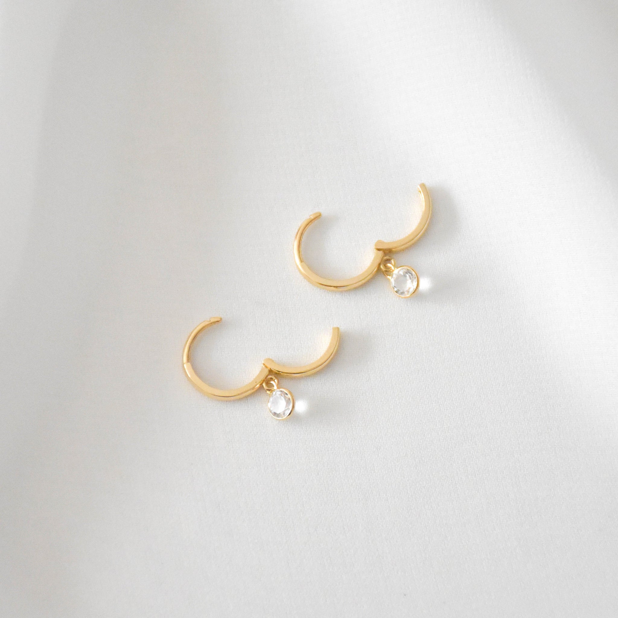14K SOLID Gold White Topaz Huggie Earrings – Vedern